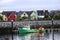 So much color in bayside village in front of boats in Dingle, Ireland.