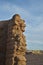 Mud brick wall ruins in extreme terrain landscape Mojave Desert, Death Valley, California USA