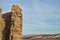 Mud brick wall ruins in extreme terrain landscape Mojave Desert, Death Valley, California USA