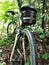 Mud stripe on back of bicycle in woods