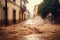 mud with water in a large stream flows down the street after a downpour and a mudflow.