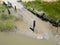 Muddy boat launch ramp, Hudeman Slough, aerial image
