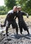 A muddy couple enjoying a local mud run