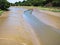 muddy riverbank of Jaudy river in Brittany