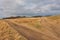 Muddy rural road, autumn landscape, crossroads,rural dirt road.