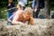 Muddy woman in a mud run.