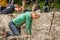 Muddy woman in a mud run.