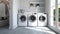 a mudroom with a head-on shot featuring side-by-side white washer and dryer units, exuding modern functionality and