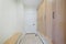 Mudroom interior of a house with white walls and door