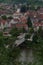 MUEHLACKER, ENZKREIS, GERMANY - JUNE 10, 2017: Residential tudor style house. view from a hill behinde the river Eny