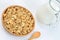 Muesli in a bamboo bowl with milk