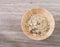 Muesli flake in wooden bowl