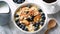 Muesli with juice and berries in bowl