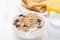 Muesli with milk and dried fruit, toast with peanut butter