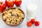 Muesli milk fruit on the table