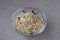 Muesli in a transparent bowl.