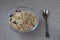 Muesli in a transparent bowl.