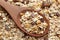 Muesli in a wooden spoon