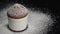Muffin cake with white powdered sugar on dark background. Slide right