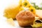 Muffin with lemon, sezt and flowers