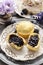 Muffins filled with blueberry and blackberry jam