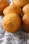 Muffins orange macro on floured table. vertical top view