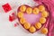 Muffins with pumpkin. Cupcakes with Valentine`s Day decor.