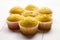 Muffins on white table. Group of cupcakes on wooden background. Homemade bakery