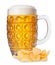 Mug of beer with foam and pile of potato chips isolate