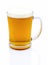 Mug of beer with foam on white background with shadow reflection. Half a liter of beer in glass on white backdrop.