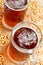 Mug of beer with german bavarian pretzel. Traditional Oktoberfest snacks and drink in bar