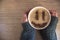 Mug of cappuccino with cinnamon for breakfast.Cinnamon powder in form of a smiley face on coffee foam.