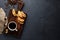 Mug of coffee and French pretzels with sugar on the kitchen table. Top view. Flat lay.