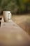 Mug of coffee on a ledge or wall