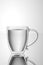 Mug with double bottom with a handle for holding by hand. 3d render