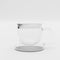 Mug with a double bottom on a white background. Double-bottomed coffee cup. Transparent square-shaped cup