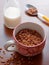 Mug filled chocolate cereals breakfast closeup