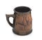 Mug with a handle of red clay on a white background