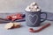 Mug of hot chocolate with whipped cream, marshmallows . Hot winter drink