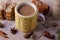 Mug of hot cocoa, good image to convey a feeling of winter and warmth. Winter drink - hot chocolate with cinnamon and anise on woo