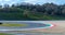 Mugello motor sport circuit asphalt racetrack turn with curbs empty