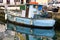 Muggia, Italy - Vintage blue fisher boat