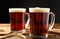 Mugs of delicious kvass, spikes and bread on table against black background