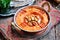 Muhammara dip of sweet peppers with walnuts, cumin, garlic and olive oil.