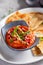 Muhammara, roasted bell pepper spread, served with roti