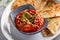 Muhammara, roasted bell pepper spread, served with roti