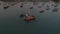MUINE, VIETNAM - MAY, 2023: Aerial drone view of beautiful seashore, fisherman on small boats are busy early morning