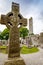 Muiredach`s Cross, Monasterboice Monastery in southern Ireland. Celtic High Cross in the historic ruins of Monasterboice