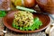 Mujadara - lentils and rice pilaf on wooden background, middle eastern cuisine recipe