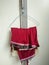 Mukenah and prayer mats that are hung using a hanger